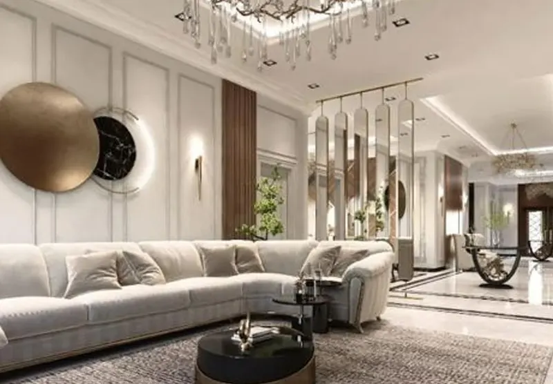 Living room with a curved white sofa in a private villa, Al Khobar